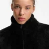 Faux fur coat with contrasting patch pockets