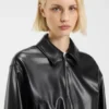 Faux-leather jacket with embossed logo Faux-leather jacket with embossed logo