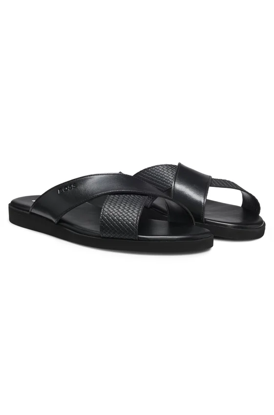 Faux-leather slides with plain and patterned straps Faux-leather slides with plain and patterned straps