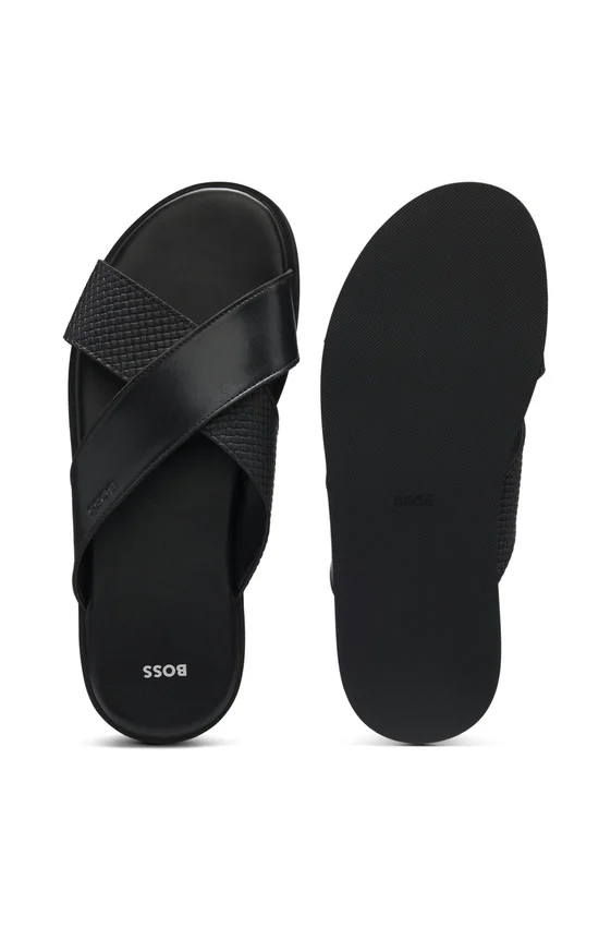 Faux-leather slides with plain and patterned straps Faux-leather slides with plain and patterned straps