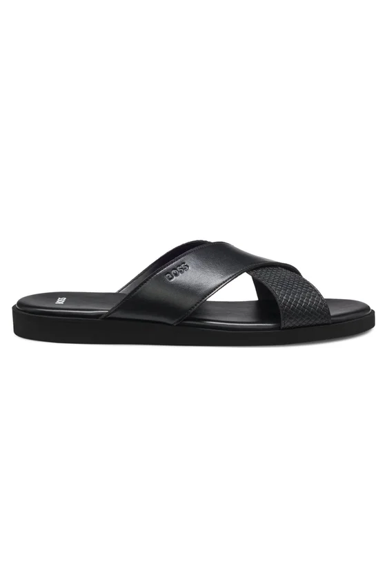 Faux-leather slides with plain and patterned straps Faux-leather slides with plain and patterned straps