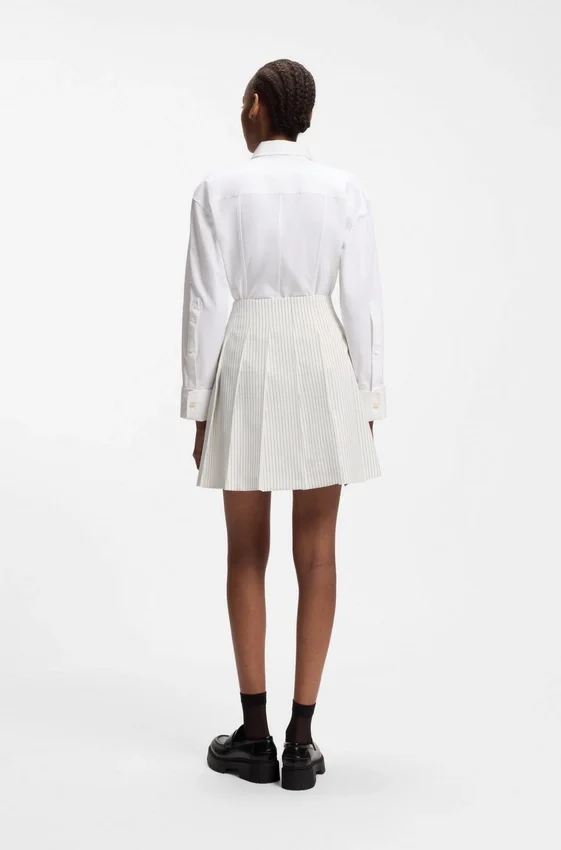 Faux-wrap mini skirt with pinstripe Faux-wrap mini skirt with pinstripe