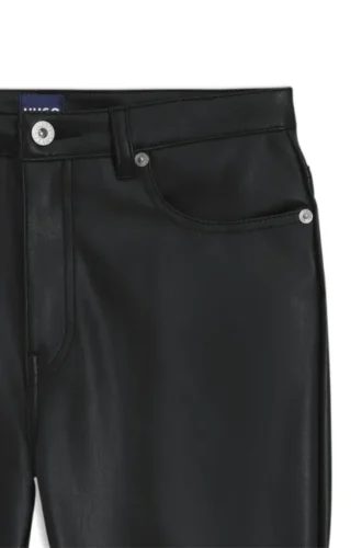 Flared trousers in faux leather