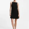 Front-pleat dress with balloon skirt Front-pleat dress with balloon skirt