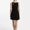 Front-pleat dress with balloon skirt Front-pleat dress with balloon skirt