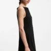 Front-pleat dress with balloon skirt Front-pleat dress with balloon skirt