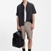 Grained backpack with stacked-logo trim