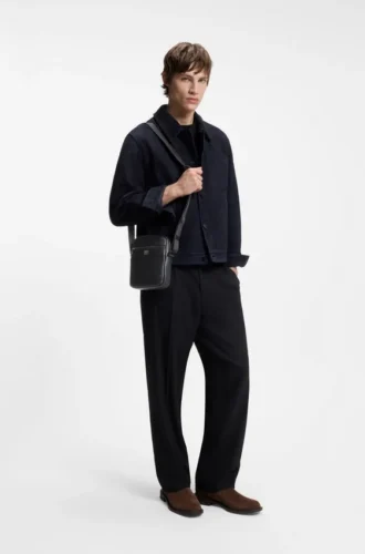 Grained reporter bag with stacked-logo trim
