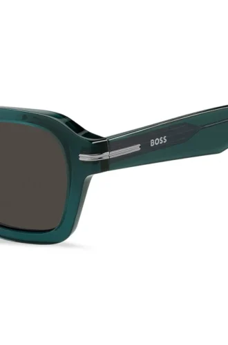 Green acetate sunglasses with temple logo