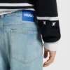 Green-cast slim-fit jeans in stretch denim