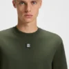 Interlock-cotton T-shirt with metallic stacked-logo badge