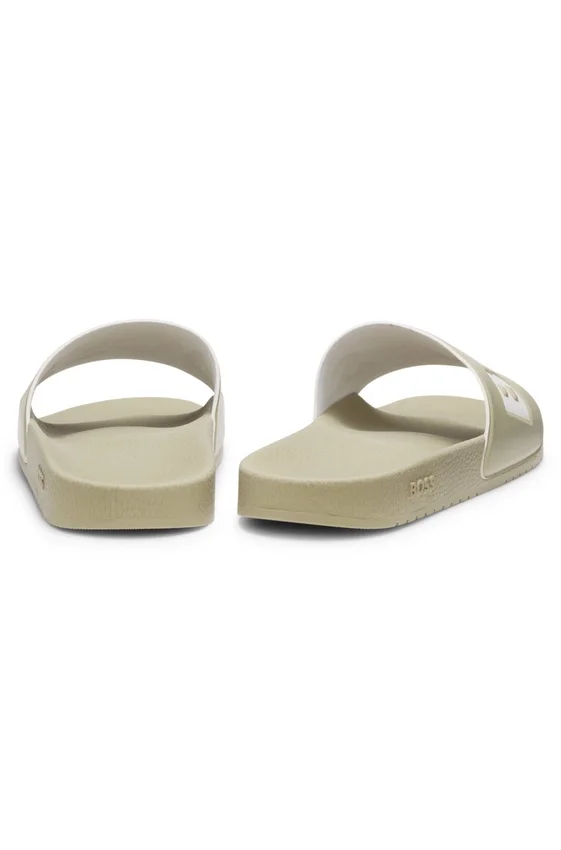 Italian-made slides with large logo detail Italian-made slides with large logo detail