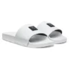 Italian-made slides with stacked-logo uppers