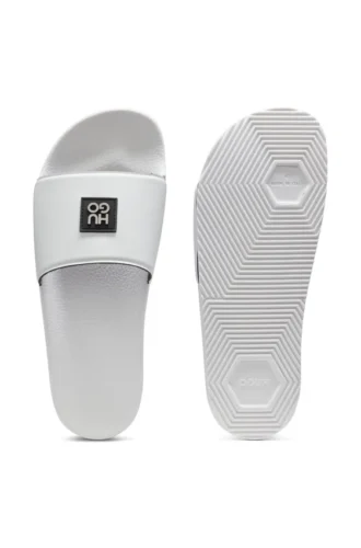 Italian-made slides with stacked-logo uppers Italian-made slides with stacked-logo uppers