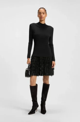 Jersey dress with feathered plissé pleats