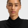Jersey dress with feathered plissé pleats Jersey dress with feathered plissé pleats