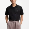 Johnny-collar polo shirt with broderie stripes
