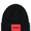 Kids’ beanie hat with red rubber logo label Kids’ beanie hat with red rubber logo label