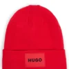 Kids’ beanie hat with red rubber logo label Kids’ beanie hat with red rubber logo label