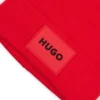 Kids’ beanie hat with red rubber logo label Kids’ beanie hat with red rubber logo label