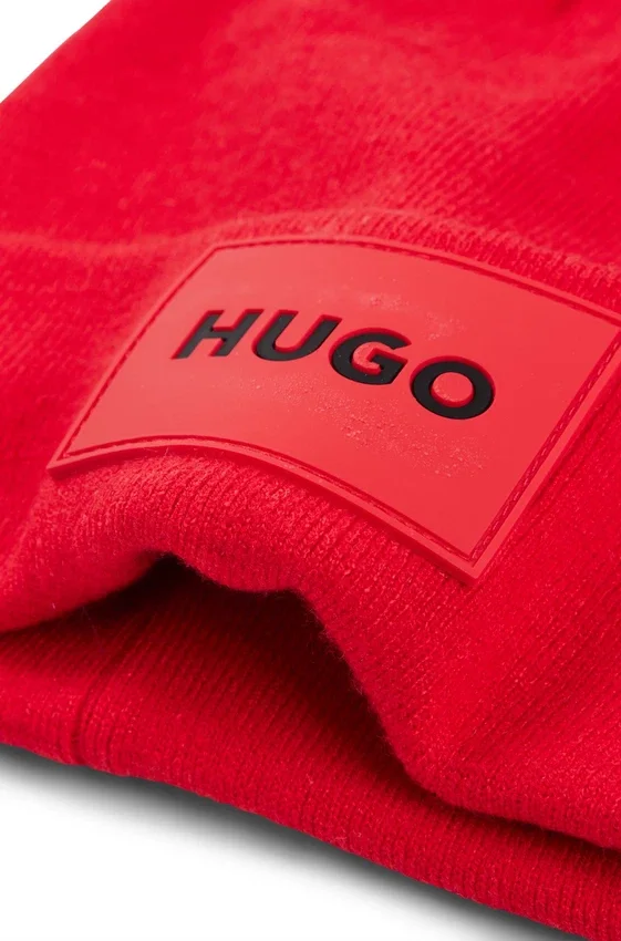 Kids’ beanie hat with red rubber logo label Kids’ beanie hat with red rubber logo label