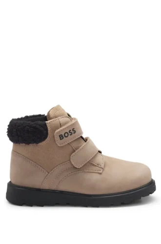 Kids’ boots in leather with faux-shearling collar Kids’ boots in leather with faux-shearling collar