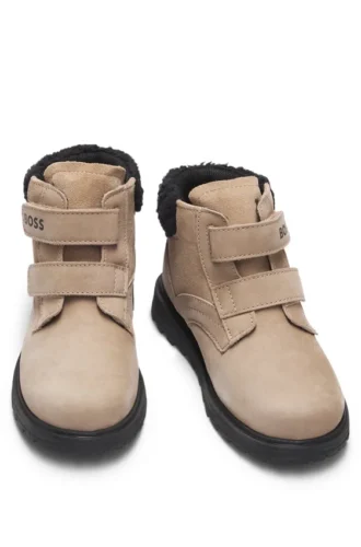 Kids’ boots in leather with faux-shearling collar Kids’ boots in leather with faux-shearling collar