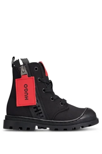 Kids’ boots with branded leather zip puller