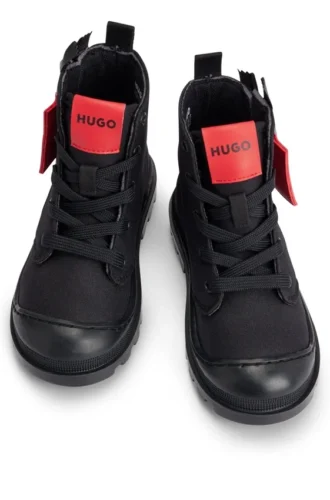 Kids’ boots with branded leather zip puller