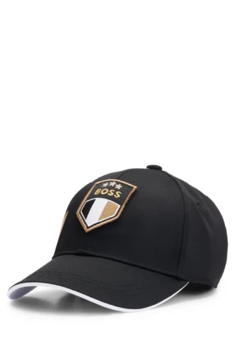 Kids’ cap with signature details and colour-blocking