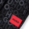Kids’ cotton-blend tracksuit bottoms with all-over logo print