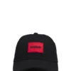 Kids’ cotton-twill cap with red logo label