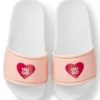 Kids’ faux-leather slides with heart-shaped logo print Kids’ faux-leather slides with heart-shaped logo print