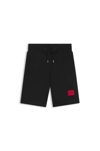 Kids’ fleece shorts with logo label