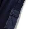 Kids’ fleece tracksuit bottoms with cargo pockets