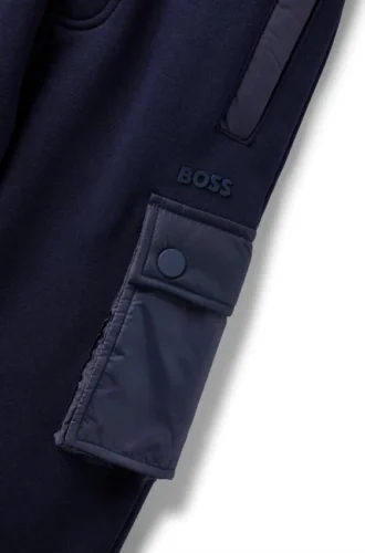 Kids’ fleece tracksuit bottoms with cargo pockets
