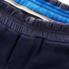 Kids’ fleece tracksuit bottoms with cargo pockets