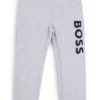 Kids’ fleece tracksuit bottoms with vertical logo print