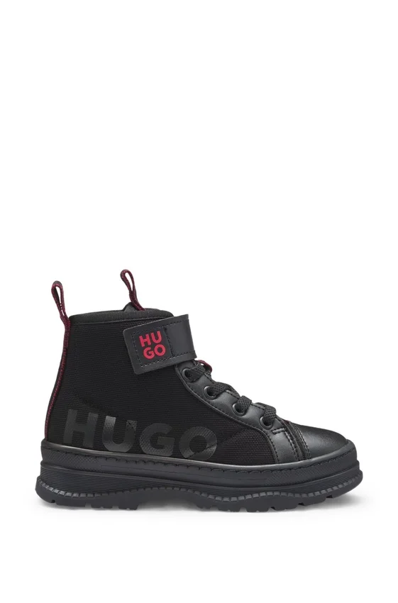 Kids’ half boots in leather and water-repellent canvas Kids’ half boots in leather and water-repellent canvas
