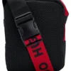 Kids’ logo-print messenger bag in canvas Kids’ logo-print messenger bag in canvas