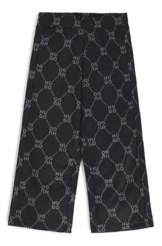 Kids’ loose-fit tracksuit bottoms with stacked-logo print Kids’ loose-fit tracksuit bottoms with stacked-logo print