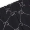 Kids’ loose-fit tracksuit bottoms with stacked-logo print Kids’ loose-fit tracksuit bottoms with stacked-logo print