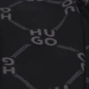 Kids’ loose-fit tracksuit bottoms with stacked-logo print