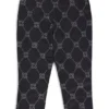 Kids’ loose-fit tracksuit bottoms with stacked-logo print