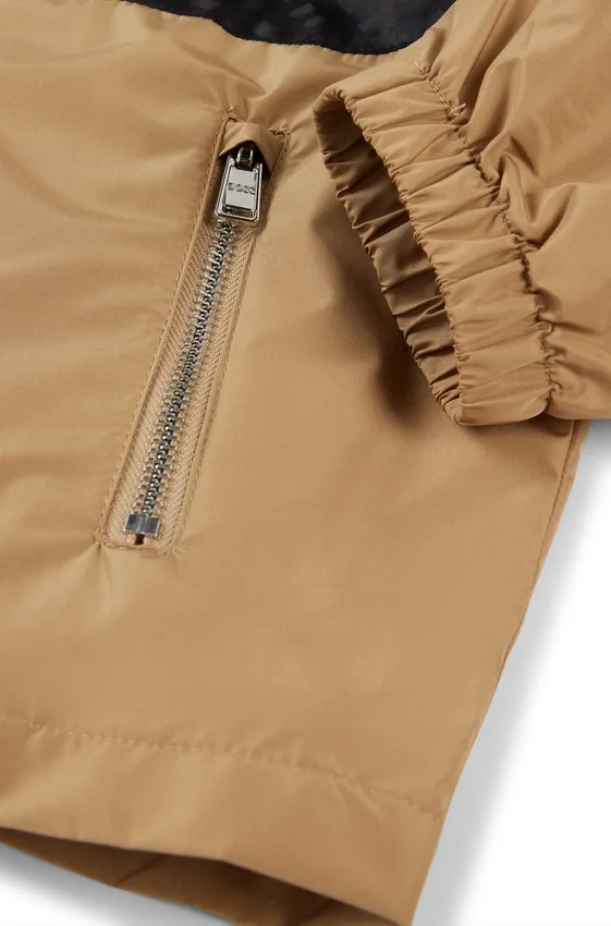 Kids’ monogram-band windbreaker with waterproof finish Kids’ monogram-band windbreaker with waterproof finish