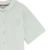 Kids’ polo dress in stretch-cotton piqué Kids’ polo dress in stretch-cotton piqué