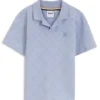 Kids’ polo shirt in stretch cotton with a quilted effect