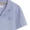 Kids’ polo shirt in stretch cotton with a quilted effect
