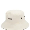 Kids’ reversible bucket hat in ripstop and cotton Kids’ reversible bucket hat in ripstop and cotton
