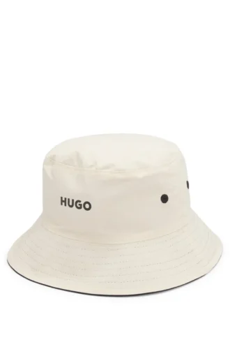 Kids’ reversible bucket hat in ripstop and cotton